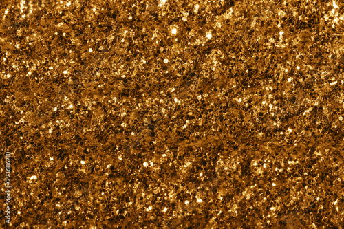 gold glitter texture festive abstract background, workpiece for design,Christmas background, soft focus photo