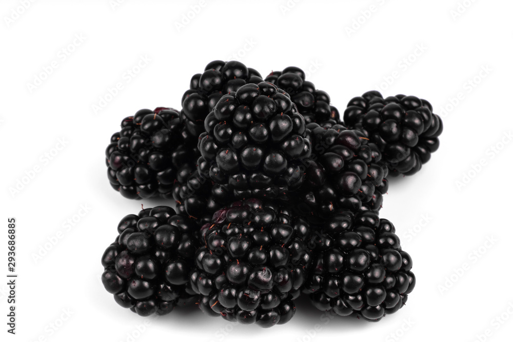 useful berry blackberry dark violet color with small villi, ten pieces, highlighted in closeup on a white background useful berry blackberry dark violet color with small villi, ten pieces, highlighted in closeup on a white background