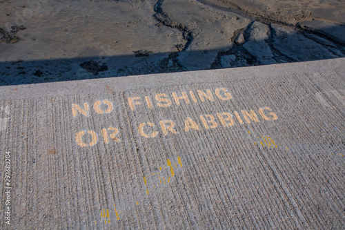 No Fishing or Crabbing sign at a Cornish harbour