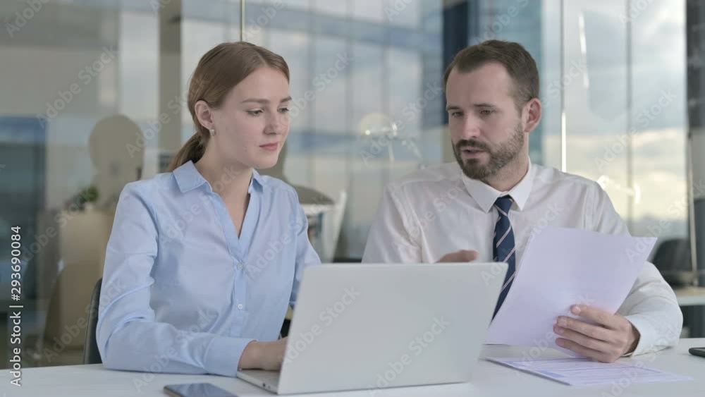 Executive Business people Working on Documents and Laptop Executive Business people Working on Documents and Laptop