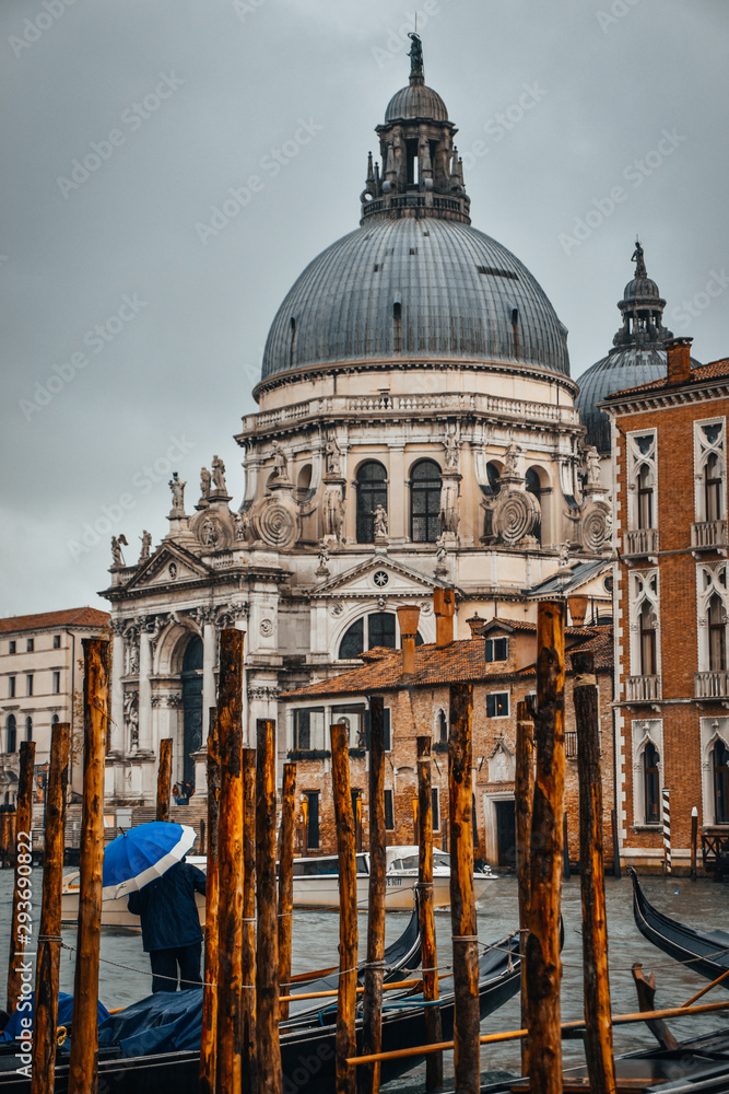 Venice canal in the rain.
