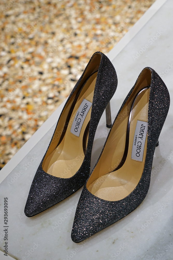 VENICE, ITALY -8 APR 2019- View of expensive high heel pump shoes by luxury footwear  brand Jimmy Choo London for sale in a store in Venice. Stock Photo | Adobe  Stock