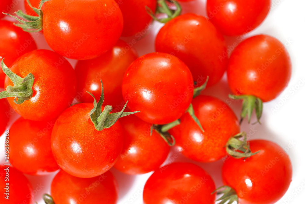 fresh mini tomatoes on a white background fresh mini tomatoes on a white background