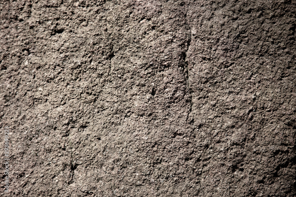 Scabrous gray natural stone or rock texture background Scabrous gray natural stone or rock texture background