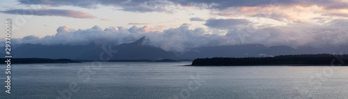 Beautiful Panoramic View of American Mountain Landscape on the Ocean Coast during a cloudy and colorful sunrise in fall season. Taken in Glacier Bay National Park and Preserve, Alaska, USA. © edb3_16