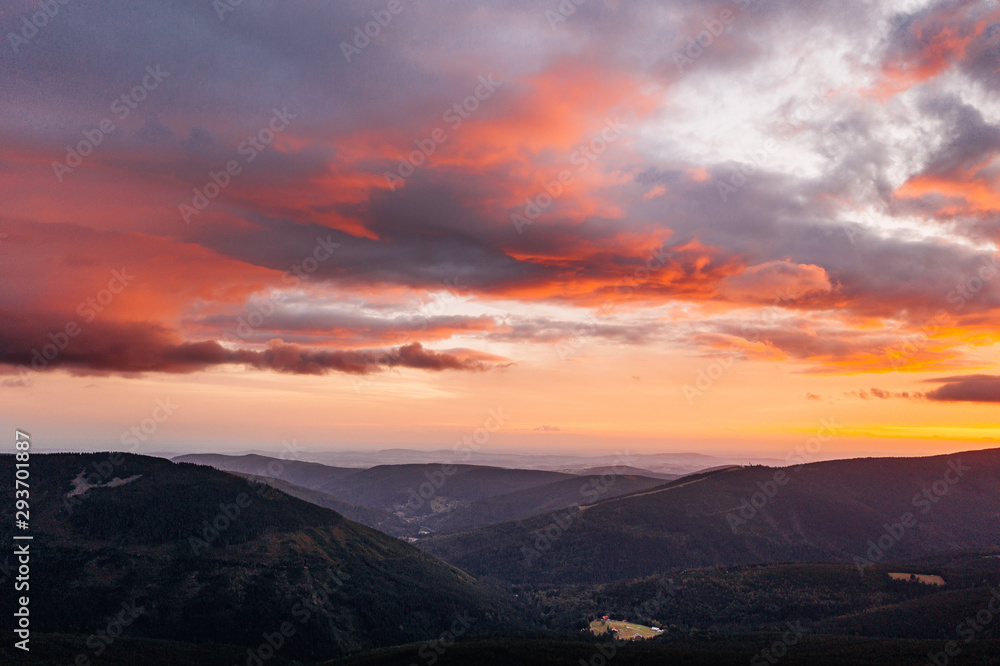 Aerial drone photography of giant mountains, sunset over Špindlerův Mlýn.