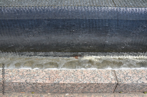 water fountain with flowing water and bubbles