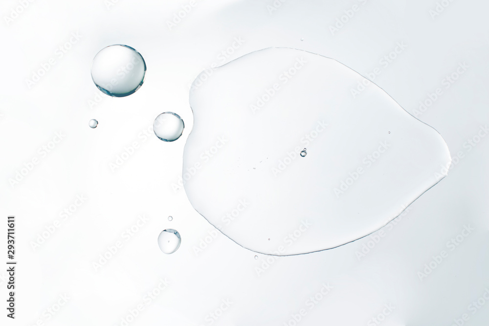 Cosmetic liquid or water serum on white background - obrazy, fototapety, plakaty 