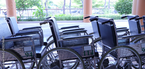 Group of wheelchairs in front of a hospital
