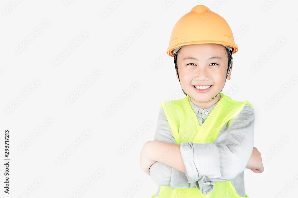 Little boy in engineering uniform with helmet and copy space Little boy in engineering uniform with helmet and copy space