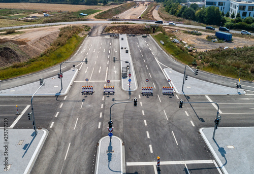 Aerial photograph of road cross under construction. building new streeet area connection Viewpoint from above photo