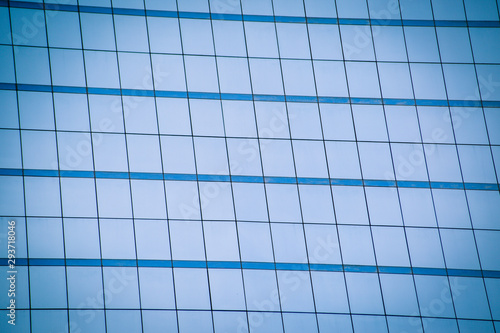 Blue glass windows of office building