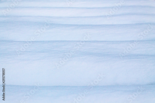 Clean and smooth snowdrift. Waves in the snow