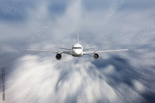 Airplane jet flying on blur motion sky background, concept aviation air transport.