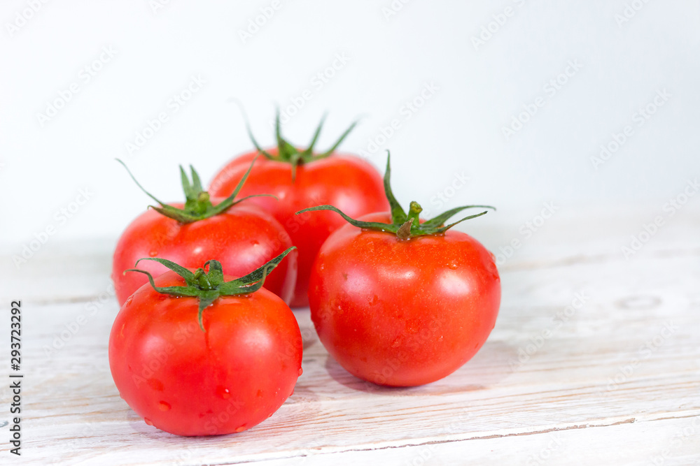 Harvest. Red tomatoes with a green stem. Space for your text. Harvest. Red tomatoes with a green stem. Space for your text.