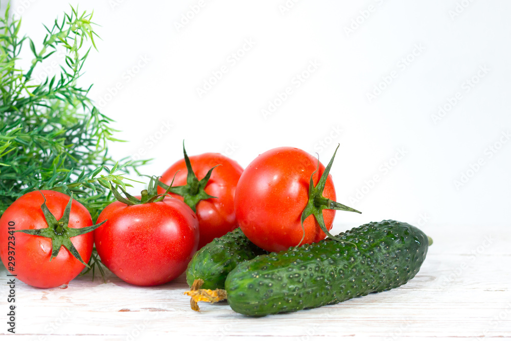 Harvest. Red tomatoes with a green stem. Space for your text.