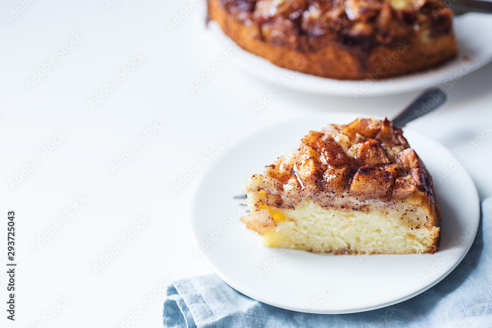 white background with a piece of apple pie