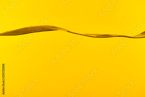 wavy transparent deep water on yellow background