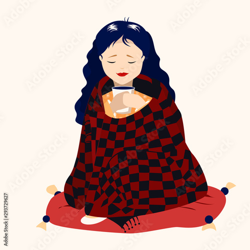 girl with a Cup of coffee and a blanket