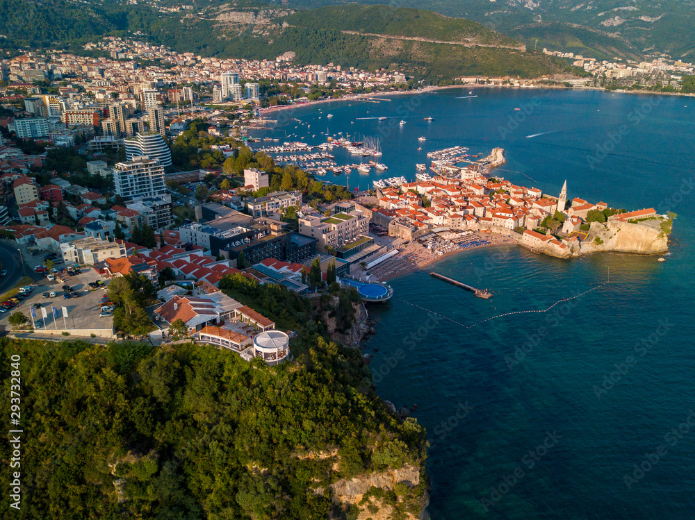 Aerial view of Budva, the old city (stari grad) of Budva, Montenegro. Jagged coast on the Adriatic Sea Center of Montenegrin tourism, well-preserved medieval walled city, sandy beaches