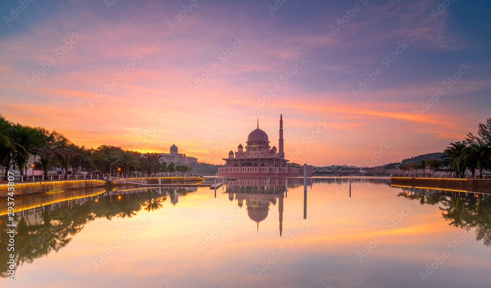 Putra Mosque motion sky sunrise moments. The Mosque is the principal mosque of Putrajaya, Landmark in Malaysia / Shallow depth of field, slight motion blur.