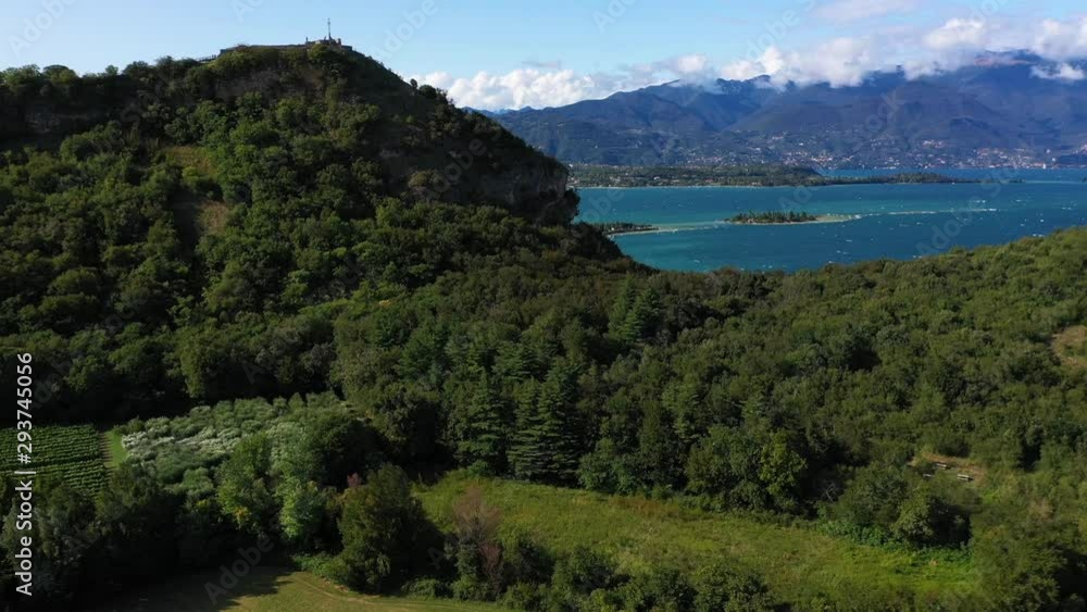 Rocca di Manerba in Garda lake, Italy. Beautiful view on lake. View aerial by Drone Rocca di Manerba in Garda lake, Italy. Beautiful view on lake. View aerial by Drone