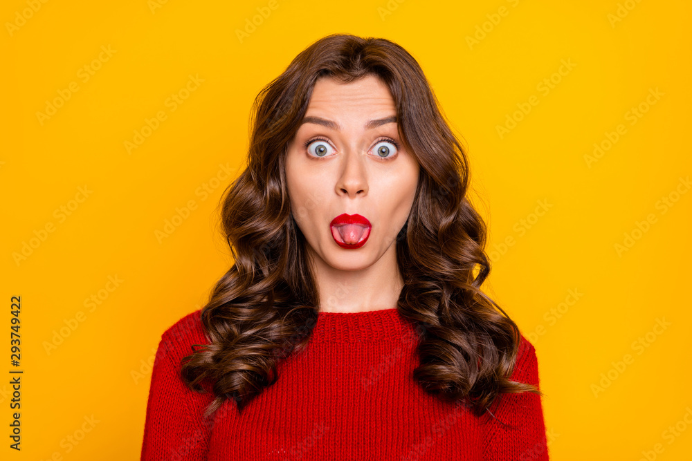 Photo of funny hilarious cute pretty sweet playful girlfriend sticking her tongue out to tease you while isolated over yellow vivid color background Photo of funny hilarious cute pretty sweet playful girlfriend sticking her tongue out to tease you while isolated over yellow vivid color background