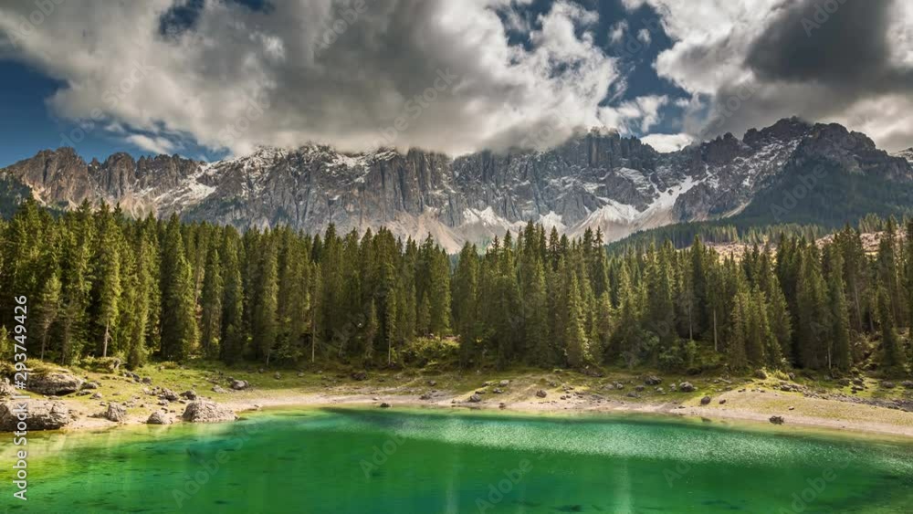 Timelapse of Mountain Carezza lake, Dolomites, Italy Timelapse of Mountain Carezza lake, Dolomites, Italy