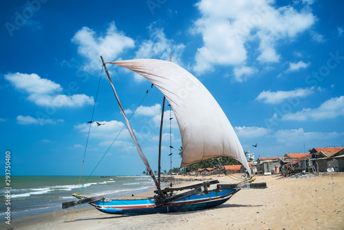 Vászonkép Oruwa traditional fishing sailboat at Negombo Beach, Negombo, Gampaha District,