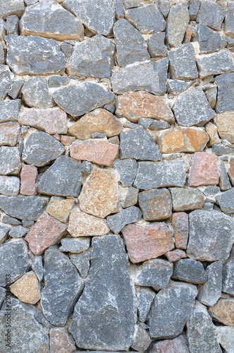 The texture of the wall is made of natural stone.