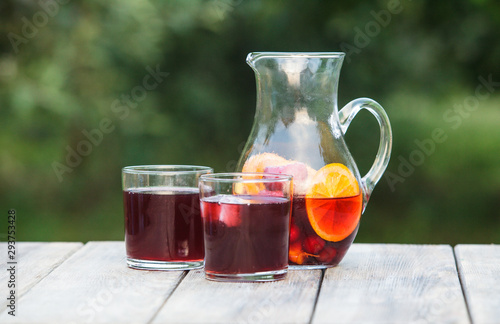 Fotografie, Obraz Refreshing sangria or punch with fruits in pincher