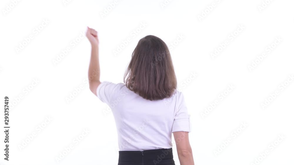 Rear view of happy businesswoman with fists raised Rear view of happy businesswoman with fists raised