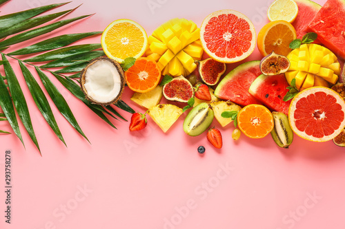 Fototapeta Naklejka Na Ścianę i Meble -  Sweet ripe fruits on color background