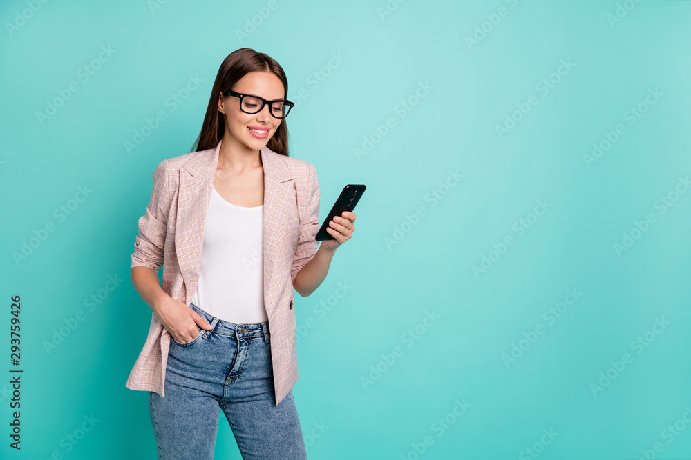 Portrait of her she nice attractive pretty smart clever content cheerful cheery straight-haired lady using device browsing chatting isolated on bright vivid shine blue green teal turquoise background Portrait of her she nice attractive pretty smart clever content cheerful cheery straight-haired lady using device browsing chatting isolated on bright vivid shine blue green teal turquoise background