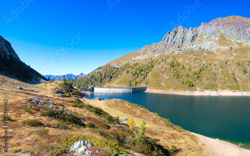 The lake Colombo dam with the Becco lace in the Brembana valley orobie Alps