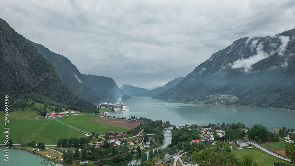 Dramatic landscape of the Skjolden village, located at the end of the Lustrafjorden, a branch of the Sognefjorden fjord, surrounded by waterfalls and steep mountains, Skjolden, Norway