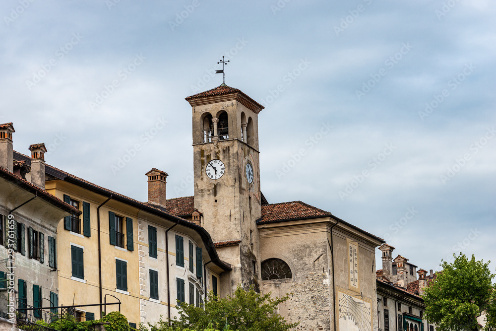 Medieval church of San Giacomo (St James) with the ancient bell tower and sundial. Feltre, Belluno province, Veneto, Italy, south Europe