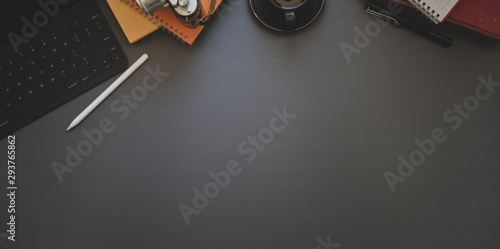 Dark luxury workspace with office supplies with copy space