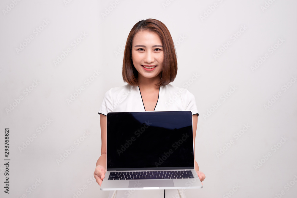 asian business woman holding laptop computer on white background asian business woman holding laptop computer on white background
