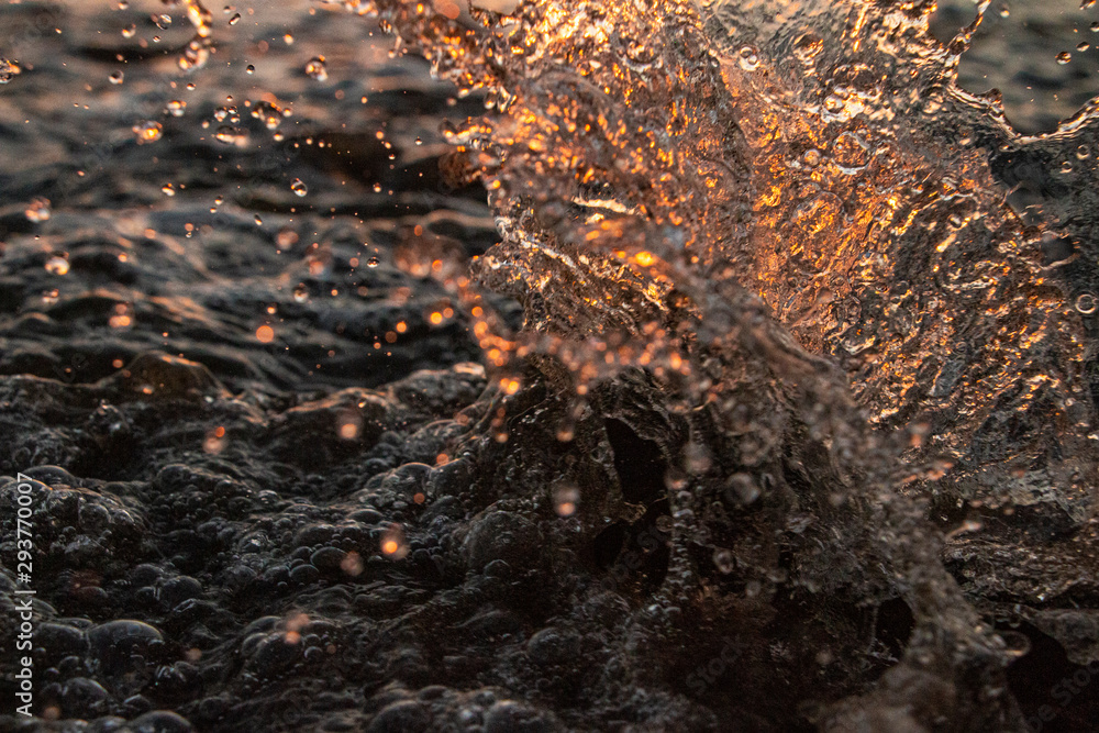 glassball being swallowed by a breaking wave glassball being swallowed by a breaking wave
