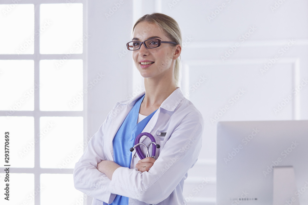 Portrait of a happy smiling young doctor in headset in office Portrait of a happy smiling young doctor in headset in office