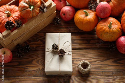 Gift boxes with pumpkins garlands holiday concept.
