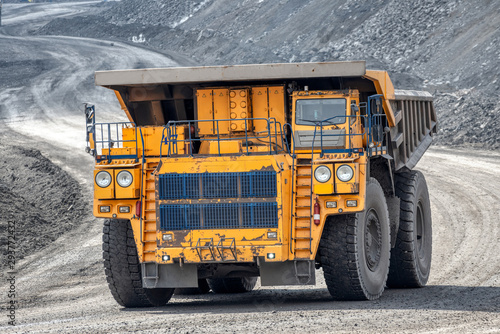 Large quarry dump truck. Transport industry.