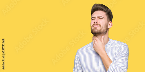 Quadro em tela Young handsome man Touching painful neck, sore throat for flu, clod and infectio