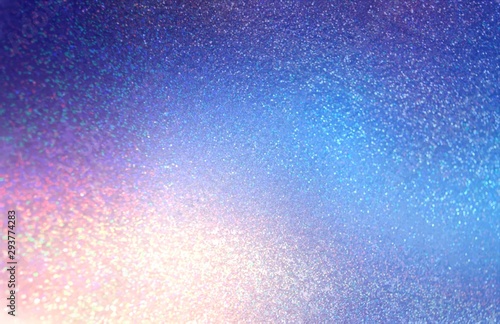 Festive glitter blue azure pink colorful background. Iridescent shimmer texture. Bright shine and small sparkles pattern.
