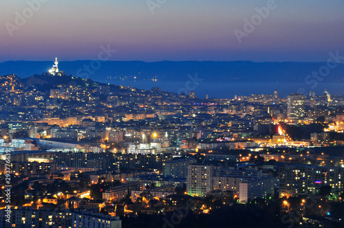 Marseille city center and Notre Dame de la Garde at blue hour from the hills © EA Photography