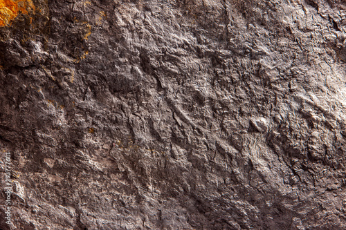Kamienny tło, skały ścienny tło z szorstką teksturą. Abstrakcyjna, nieczysty i teksturowana powierzchnia z kamienia. Szczegóły natury skał.
