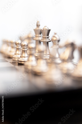 Modern chessboard on a black table
