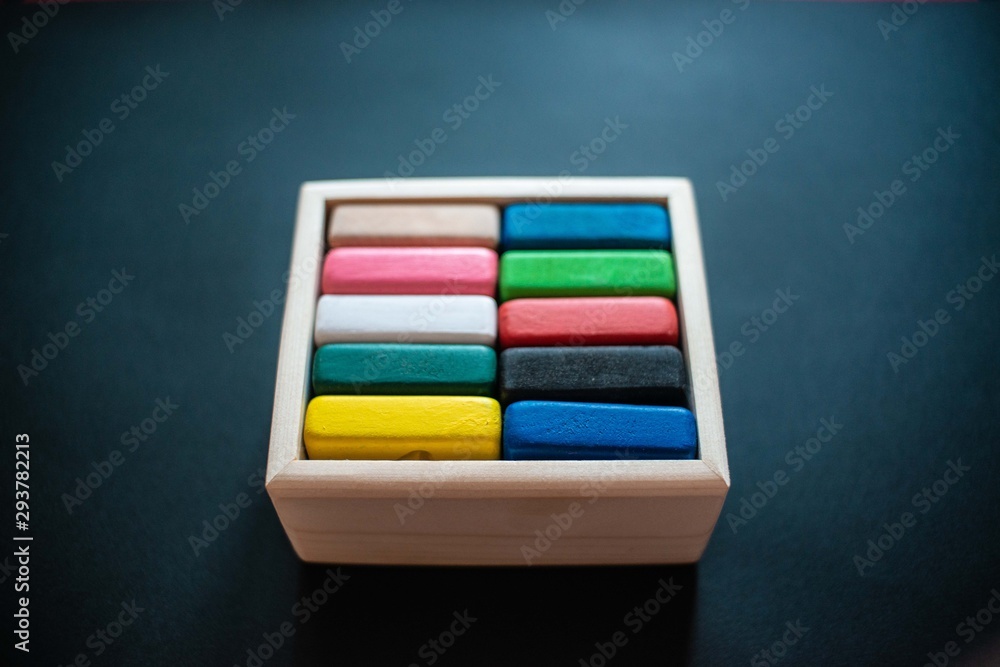 Fototapeta premium wooden squares with geometric shapes