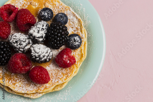Waffles and wild berries close-up